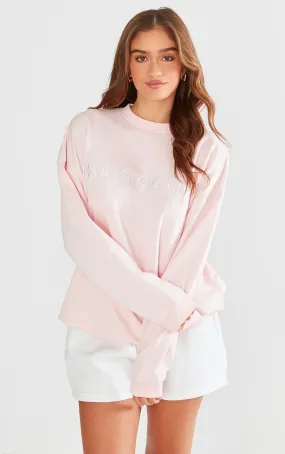 PRETTYLITTLETHING Sweat rose tendre à slogan nœud brodé