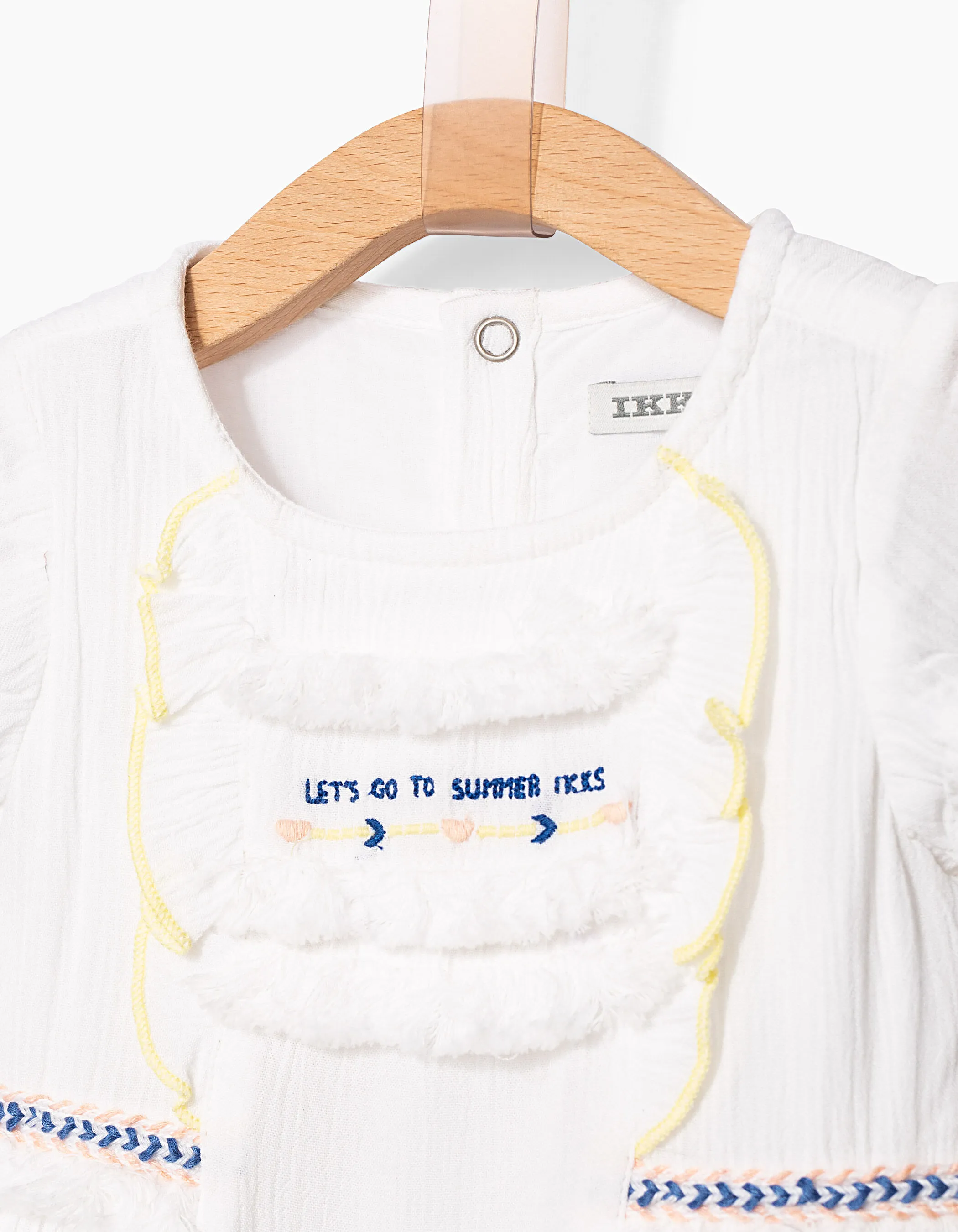 Robe blanc optique à broderies bébé fille